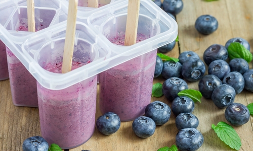 Healthy home made, quick and easy blueberry, yoghurt and protein ice blocks.